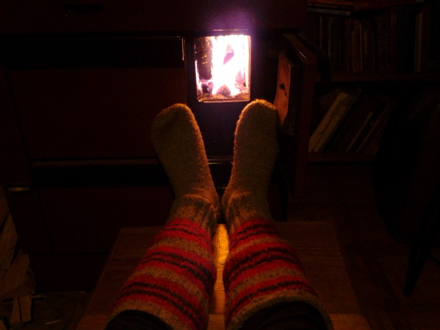 back at home: wool socks and fire