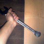 fastening a nut to the threaded rod