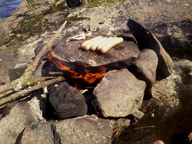 Cooking on a heated rock