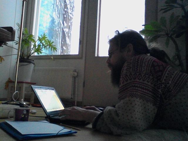 Coding on the floor of my friends' living room.